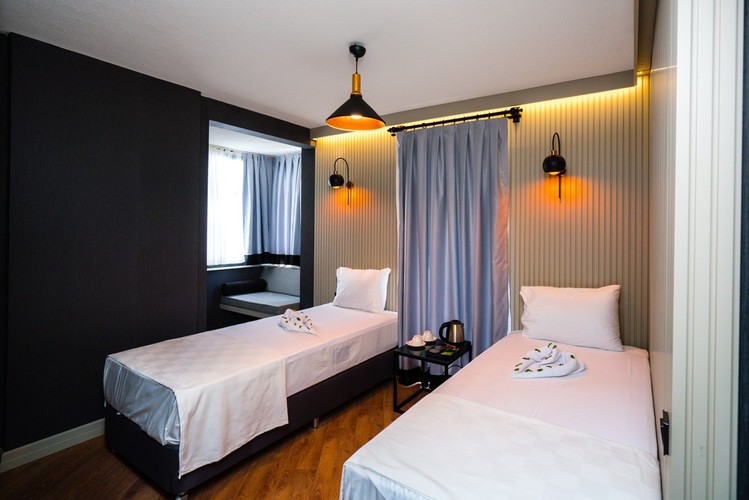 Deluxe Iki Ayrı Yataklı Oda