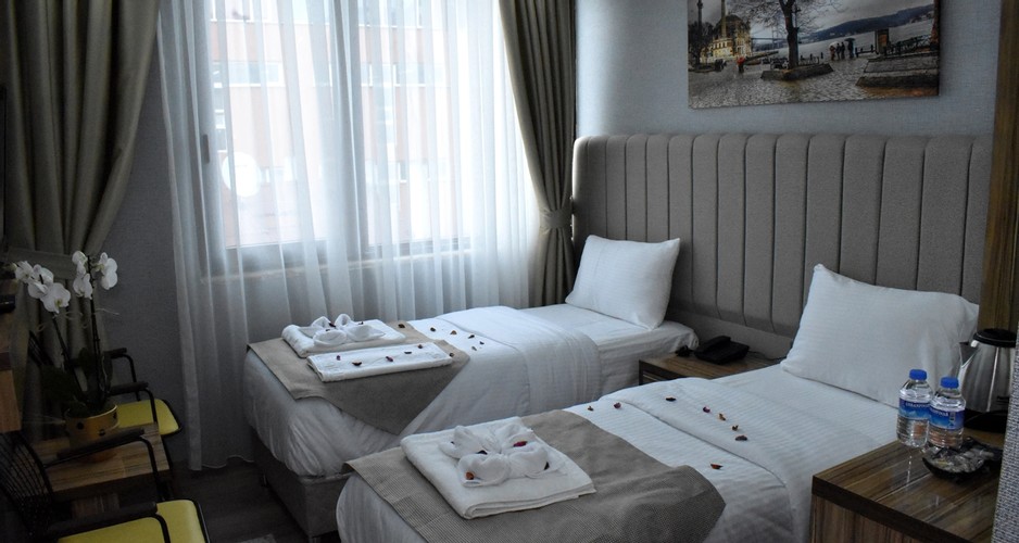 Deluxe Iki Ayrı Yataklı Oda