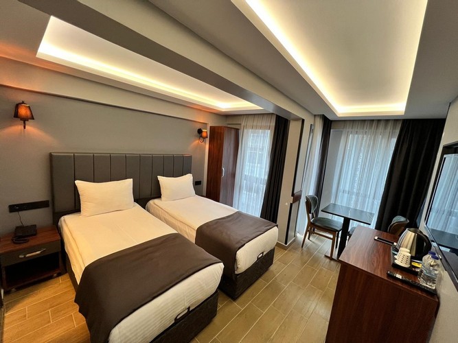 Iki Tek Kişilik Yataklı Oda