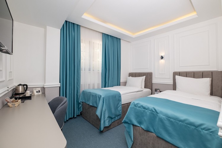 Deluxe Iki Ayrı Yataklı Oda