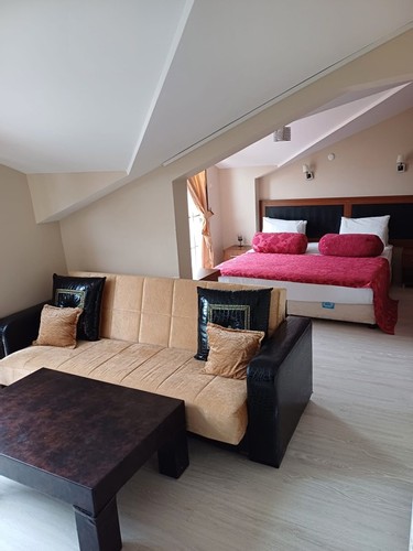 Deluxe Şömineli Oda, Kısmi Deniz Manzaralı (Jakuzi)