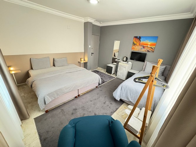 1 Double 1 Single Yataklı Oda