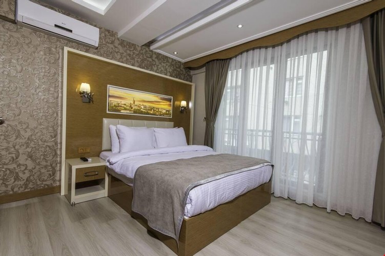 1 Duble 1 Tek Yataklı Oda